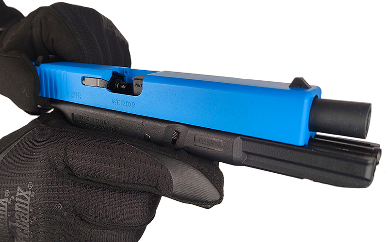 Pulling back the slide of the WE EU17 Gen.4 GBB Pistol