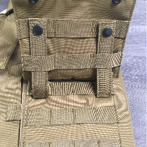 MOLLE hooks woven back through webbing on the rear of the pouch